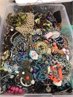 Box full of miscellaneous jewelry. 6 inches deep