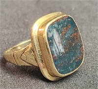 10k gold ring with green blue stone