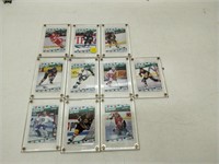 lot of hockey cards in cases