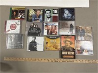 CDs & John Wayne VHS Tape