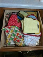 Group of hand towels and pot holders