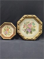 Oval framed cross stitched pictures
