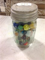 Pint jar of assorted marbles