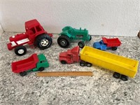 Plastic farm toys. Trucks.
