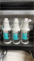 Three bottles of 3M disinfectant
