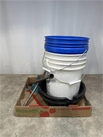 Drain pans, tire iron, funnel, and buckets