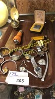 Collection of wrist watches, pocket knives,