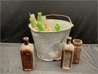 Bucket of Vintage Bottles