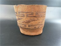 An old Chumach woven basket, deteriorating with ag