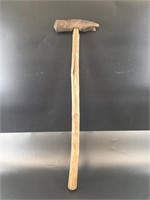 Ancient hammer, head is made from a whale's finger