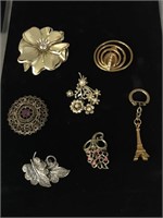 7 PC LOT OF BROOCHES AND KEYCHAIN;