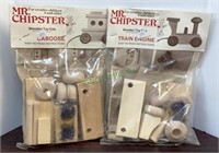 Two Mr. Chester wooden toy kits. One is a caboose
