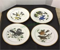 A lot of 4 beautiful dinner size collector plates