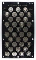 COLLECTION OF KENNEDY HALF DOLLARS IN HOLDER