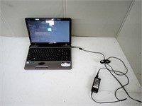 TOSHIBA LAPTOP TURNS ON WORKS