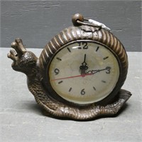 Cast Iron Snail Clock