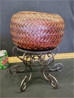 Woven basket on stand