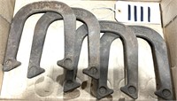 4 Wonder Cast Iron Horseshoes