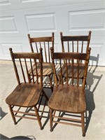 Set of four wood chairs.
