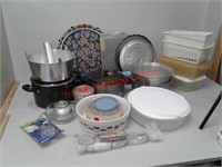 Kitchen items - pots, pans storage containers + +