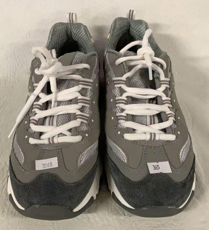 Lightly use sketcher, tennis shoes, size 8 1/2