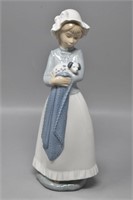 NAO by LLADRO Porcelain Girl Holding Dog Daisa