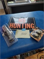 No Hunting sign, hunting knife, and cap lights