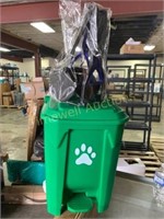 Dog waste bin with pooper scooper