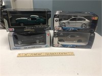 4  Die Cast Model Cars