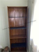 Bookcase, it looks like some of the shelves have