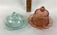 (2) reproduction depression glass butter dishes