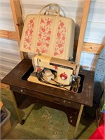Vintage sewing machine with desk and cover