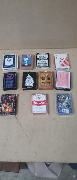 11- Assorted Decks of Playing Cards.