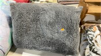 Gray, fuzzy pillows