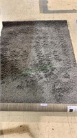 Silvery gray shag carpet rug, labeled Hampton,