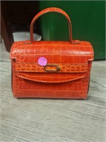 Red alligator purse