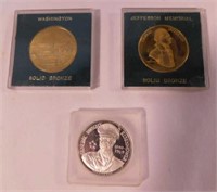 2 bronze souvenir coins in case: Washington DC -