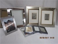 Collection of silver coloured frames various sizes