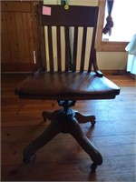 Rolling ,swivel wooden desk chair (house)