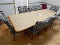 Wood conference table with chairs