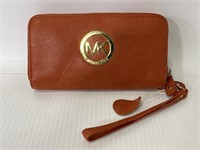 Ladies orange leather Michael Kors zipper wallet