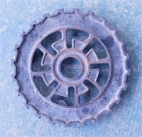 Metal seed disc plate made into a trivet