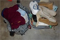 Tub Full of Shoes and Luggage Bag of Clothes