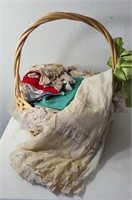 Basket of vintage linen dollies and a vintage