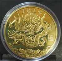 Gold Chinese dragon challenge coin