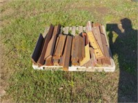 Assortment of steel square stock and angle stock