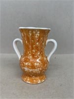 Double handled pottery vase