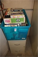 VHS TAPES AND FILE CABINET