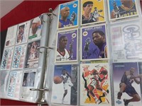 ALBUM FULL OF BASKETBALL AND FOOTBALL CARDS