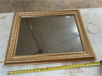 Gold framed mirror